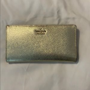 Gold Kate Spade Spencer Slim Bifold Wallet